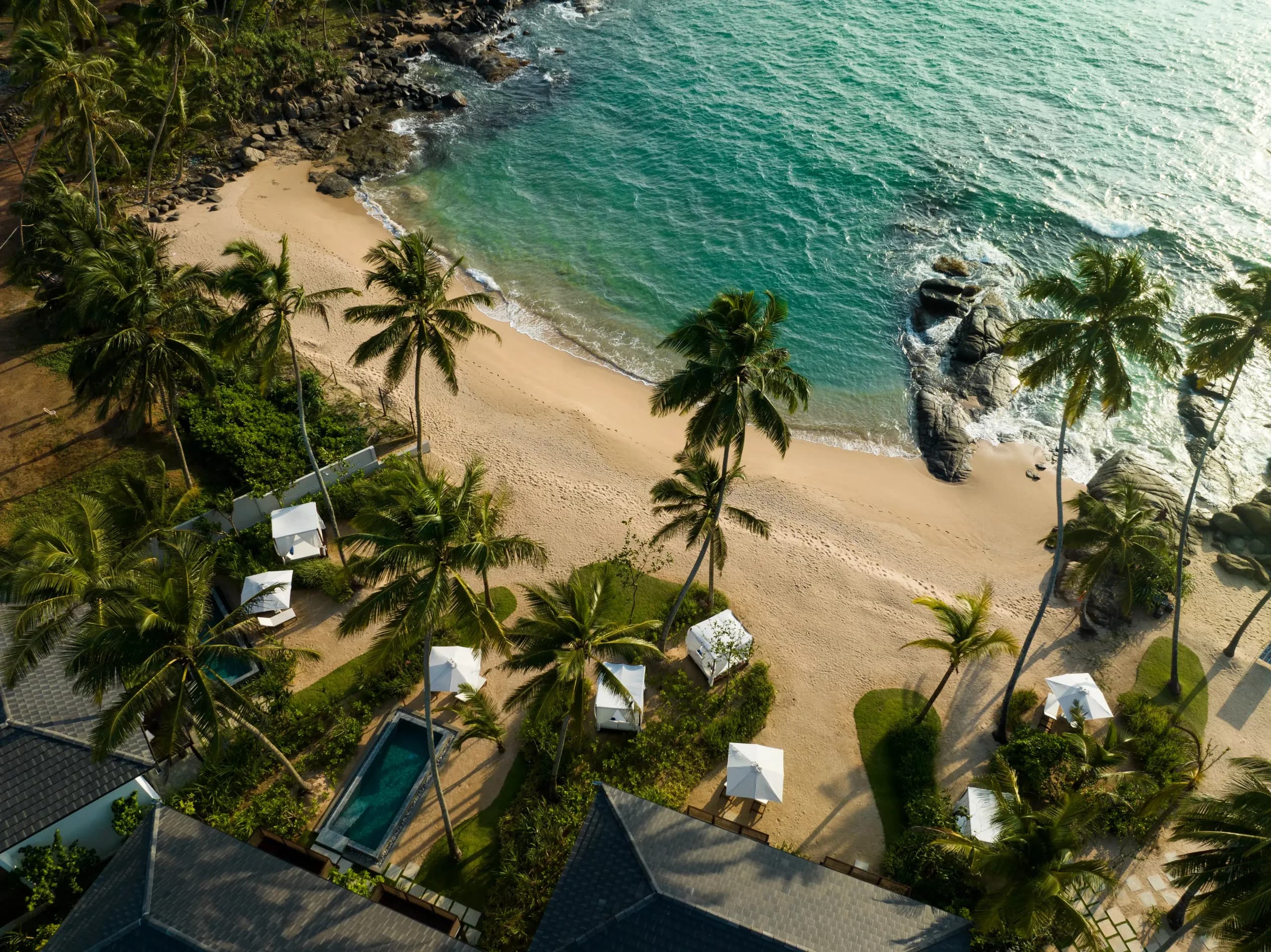 Palm-fringed cove and turquoise water on Sri Lanka's south coast